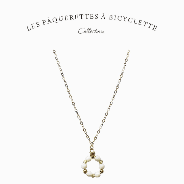 Collier en gold filled – Les pâquerettes à bicyclette 